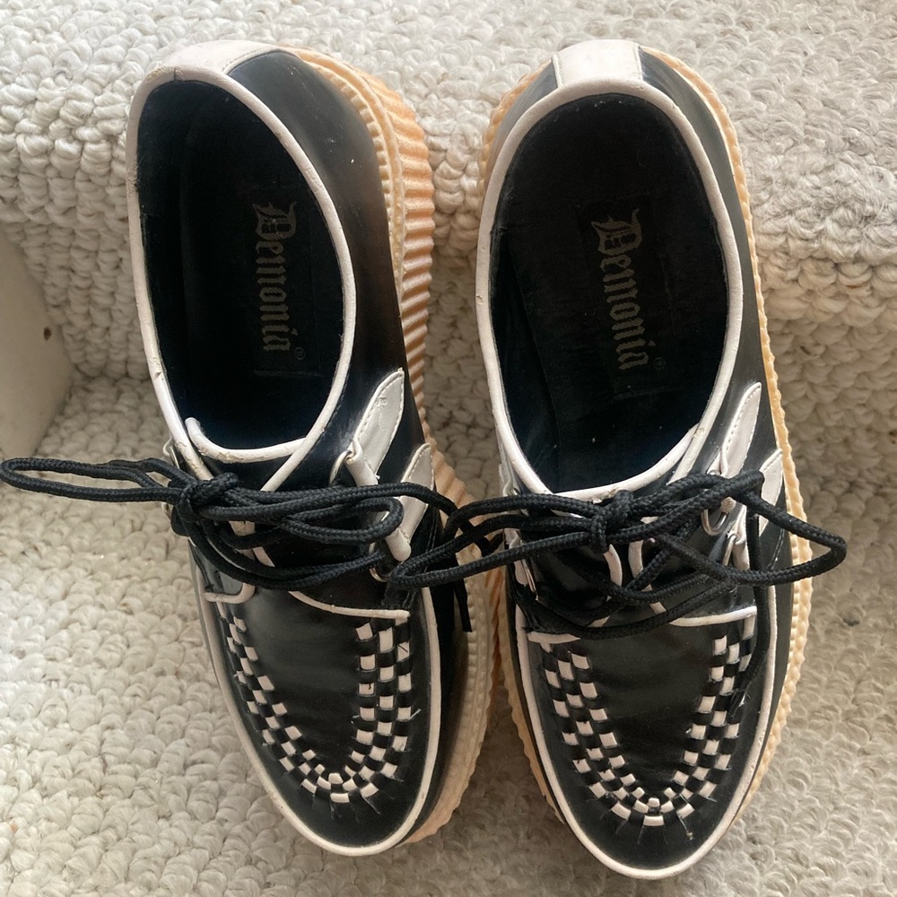 Demonica black and white creepers.